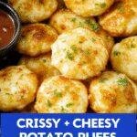 Golden crispy cheesy air fryer potato puffs served on a rustic plate garnished with herbs
